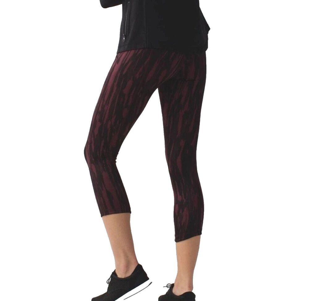 lululemon Exquisite Crops Sz 6 Painted Animal Bordeaux Drama Black Legging pants